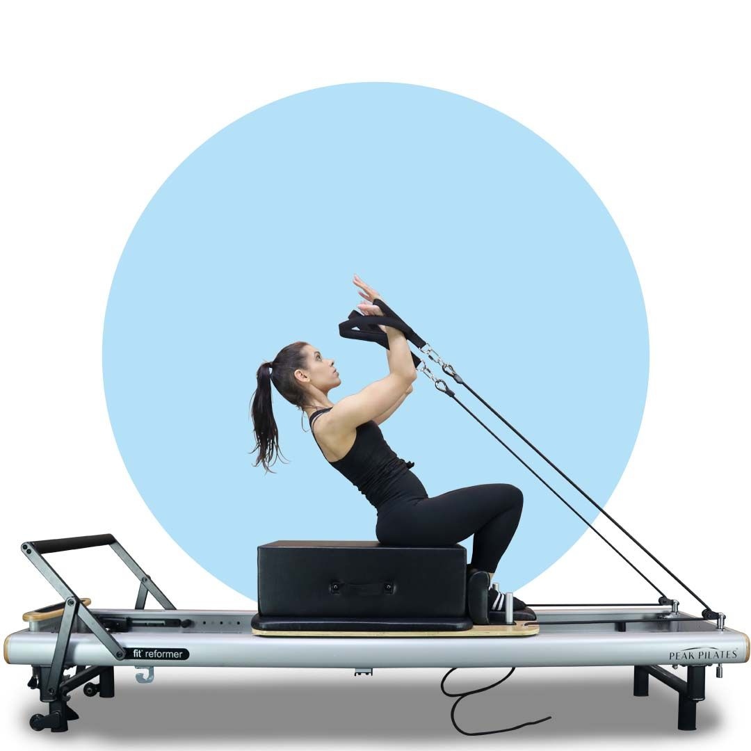 Reformer Pilates Movement - Seated bicep curls
